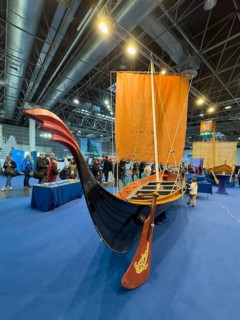 Press photo of replica Viking ship Viking boat sailing ship, large rudder blade in the middle of