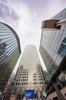 Modern glass buildings soar into the sky, an impressive urban architectural motif, Canary Wharf,