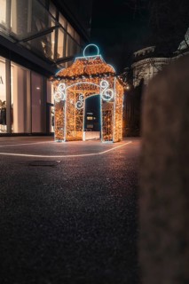 Festively illuminated pavilion at night, decorated with decorative lights, London, England, Great