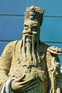 The Grand Royal Palace, mystical stone figure in front of the white pagoda, Phra Nakhon, Bangkok,
