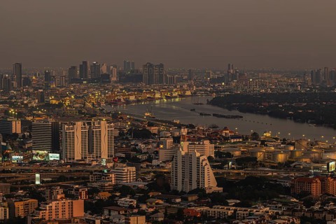 Over the rooftops of Bangkok, evening light, view of the Chao Phraya River, view from the Moon Bar