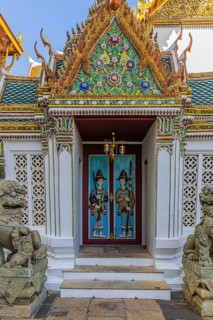 The Grand Royal Palace, side entrance of Raja Karanyasabha Hall with carved doors, Phra Nakhon,