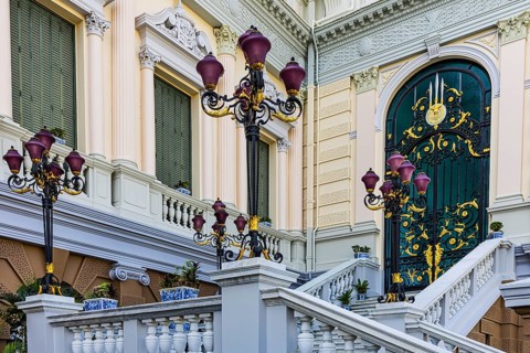 The Grand Royal Palace, side entrance with decorated gate and multi-armed lanterns, Chakri Maha