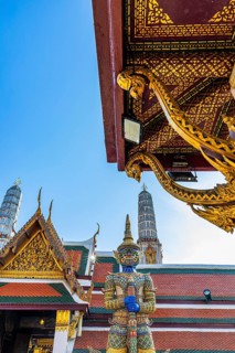 The Grand Royal Palace, Wat Phra Kaeo Buddhist Temple, guarded by a Yaksha, Phra Nakhon, Bangkok,