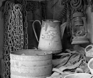 Chains, old coffee pot and collected utensils in an old cupboard on a farm, Middle Franconia,