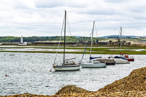 Boats and Marshes over Hurst Spit, Milford on Sea, Lymington, Hampshire, UK