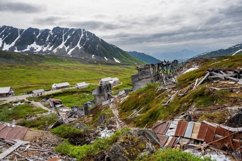 Crumbling mill and former Gold Mine Independence Mine building in mountainous landscape,