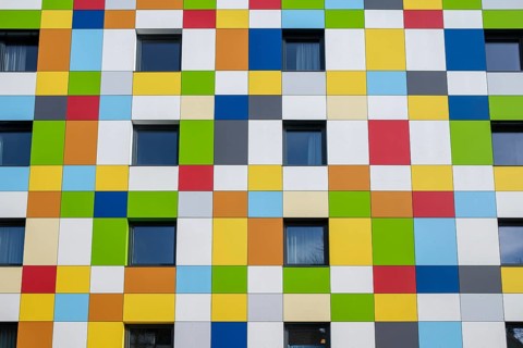 A brightly panelled house façade on an apartment building, Tuttlingen, Tuttlingen district,
