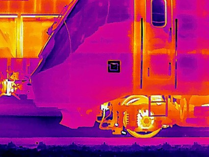 Locomotive in the train station. Thermal image or thermography, symbolic photo, interpolated.