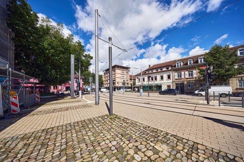 General architecture, commercial buildings, residential buildings, houses, overhead lines, tram