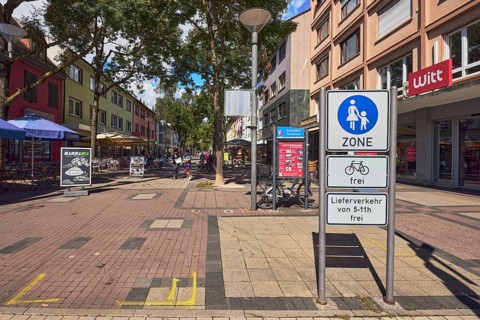 Pedestrian zone, traffic sign pedestrian zone with additional sign bicycles free and delivery