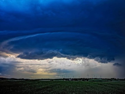 Supercell, approaching thunderstorm with impressive and threatening cloud formation of a
