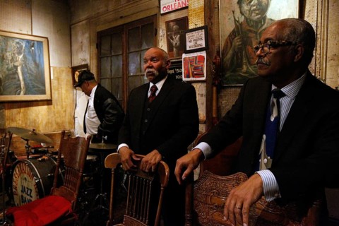 Musician at Preservation Hall ready for a jazz performance in a stylish atmosphere, New Orleans,