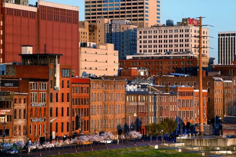 Urban skyline with old and new buildings on the riverbank in Nashville, Nashville, Tennessee, USA