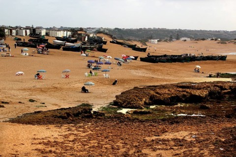Extensive beach with visitors and lots of tents on the sand, Oulidia, Marrakesh-Safi region,