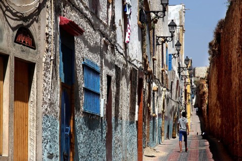 Narrow street with colorful windows and old facades in the Medina of Safi, Safi, Doukkala-Abda,