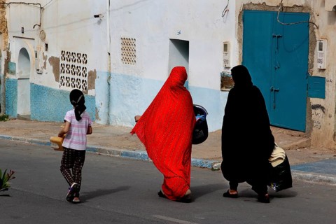 Two woman wearing traditional clothes in the old town of Sidi Ifni, Sidi Ifni, Souss-Massa, Morocco