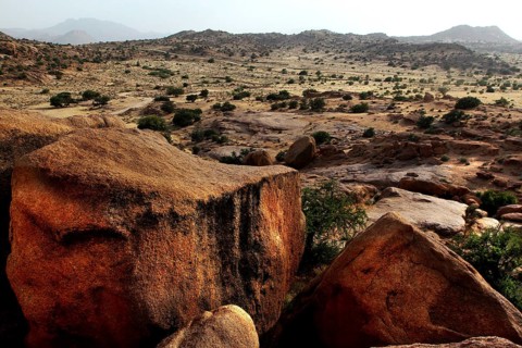 Rocks in the vast desert landscape in the region around Tafraoute, Tafraoute, Souss-Massa, Morocco