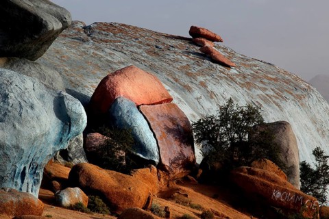 Colored rocks in the dry landscape of Tafraoute, a work by Jean Verame, Tafraoute, Souss-Massa,