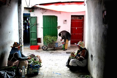 Two reef farmers offer their goods on a narrow market aisle, Tetouan, Medina, Morocco