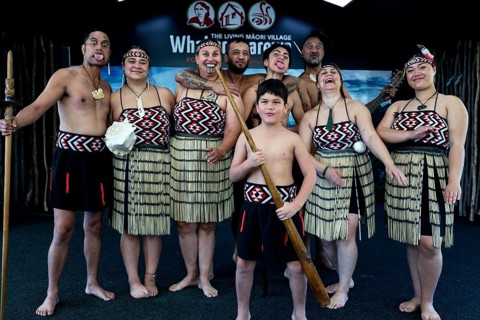 Maori group wearing traditional clothing at a cultural performance in Whakarewarewa, Rotorua, Bay