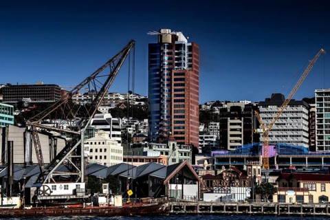 Harbour view with crane and modern buildings on Wellington Waterfront, Wellington, North Island,