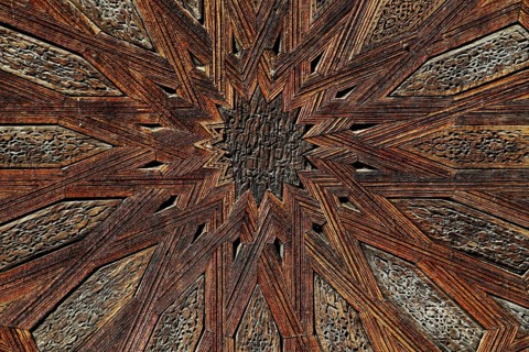 Complex wooden ceiling with geometric patterns in Medersa Bou Inania, Fez, Fès-Boulemane, Morocco