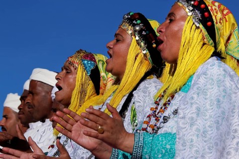 Women sing in traditional dress at the Berber Festival, Ma El Kelâa m'Gouna, Fête des Roses, Berber