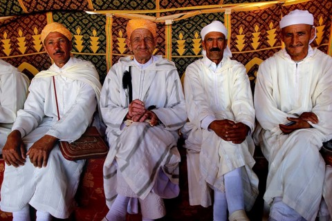 Four men wearing traditional clothes at the Fête des Roses in El Kelâa m'Gouna, El Kelâa M'gouna,