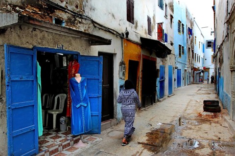Lively alley with typical blue doors in Moroccan old town, Essaouira, Marrakesh-Safi, Morocco