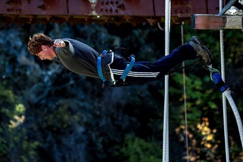 Person in free fall bungee jump from Kawarau Bridge, Queenstown, Kawarau Bridge, New Zealand