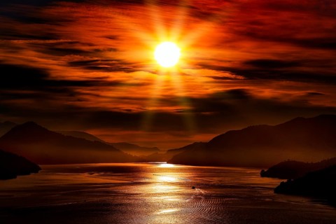 Sunrise bathes Mahau Sound in a red glow, Mahau Sound, Marlborough, New Zealand
