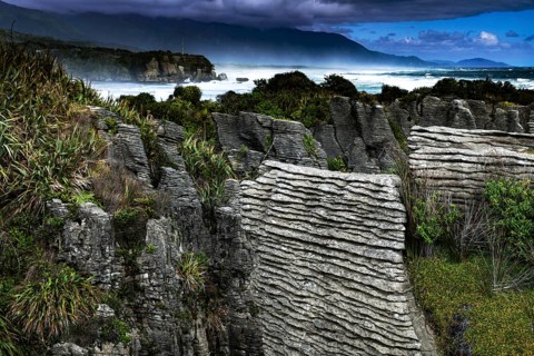 Panoramic view of Pancake Rocks with lush vegetation, Punakaiki, West Coast, New Zealand