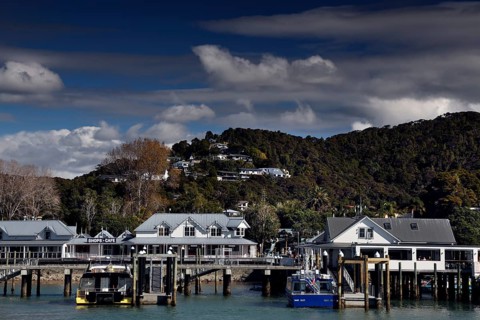Cosy view of Paihia with harbour and wooded hills, Paihia, New Zealand