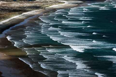Ninety Miles Beach near Cape Reinga shows wave-rich beaches with curved shores, Cape Reinga,