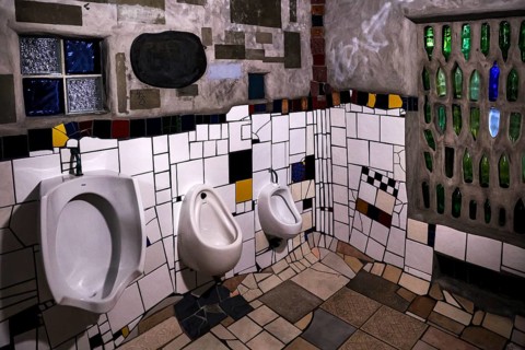 Interior view of the artistically designed Hundertwasser toilet in Kawakawa, Kawakawa, New Zealand