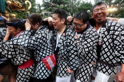 Happy Sanja Matsuris participants in traditional Japanese clothing, Tokyo, Japan