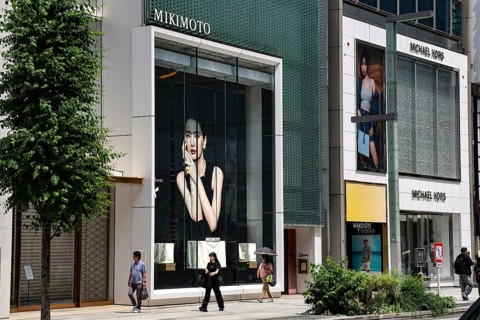 Large shop window with impressive advertising poster in Ginza, Tokyo, Tokyo, Japan