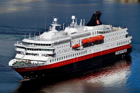 Close up Hurtigruten ferry boat, majestically on open water, Hammerfest, Finnmark, Norway