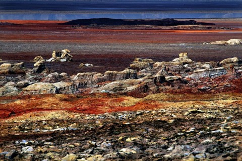 Dallol's impressive rocky landscape in warm shades of red and brown, zero