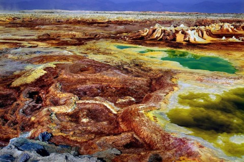 Exotic mineral-signal-filled landscape in Dallol with shades of brown and green, Dallol, Afar