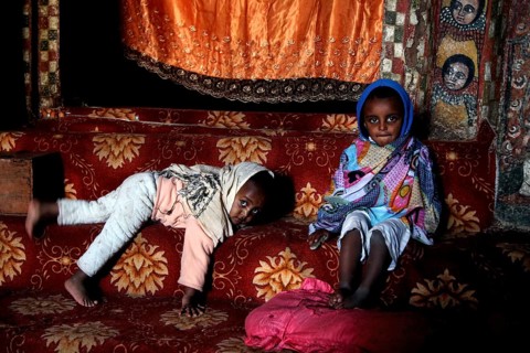 Children in traditional clothes at Debre Berhan Selassie church, zero