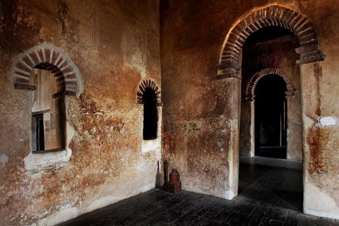 Stone wall with arches and windows inside a castle in historic Gondar, Gondar, Amhara, Ethiopia