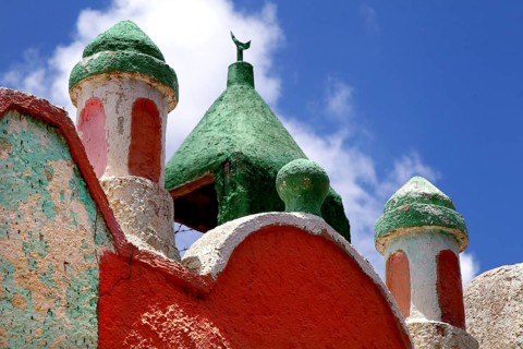 Colourful mosque domes in Harar's old town against a blue sky, Harar, Ethiopia