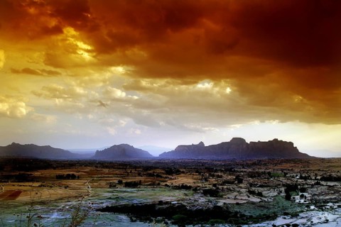 View of silhouetted mountains from Gheralta Lodge at dramatic sunset, Hawzien, zero, Ethiopia