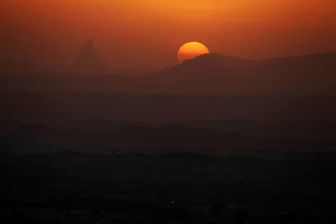 Spectacular sunset at Gheralta Lodge with silhouetted mountains, Hawzien, Tigray, Ethiopia