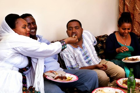 Muluye Tsegaw with family having a happy Easter dinner, Lalibela, null