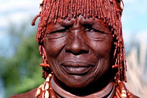 Hamer woman wearing traditional jewelry in Turmi village, Turmi, Ethiopia