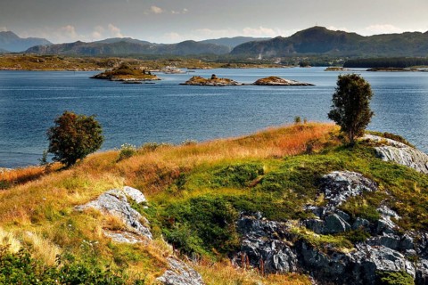 Geitøya archipelago island along Atlanterhavsveien with views of grasslands and the sea,