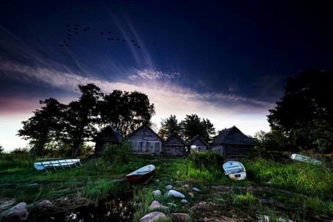 Romantic fishing sheds on Altja beach at dusk, Altja, Estonia